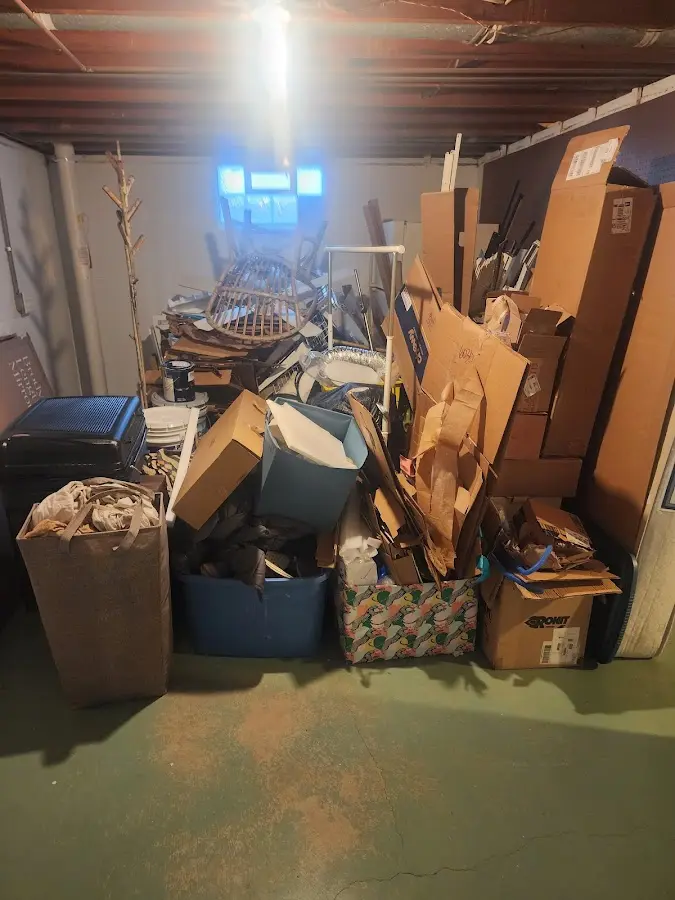 Roll-off dumpster container at job site for Cleanout Dumpster Rental in Fayetteville